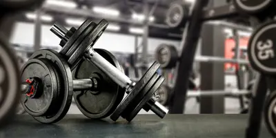 Free weights on ground in gym facility